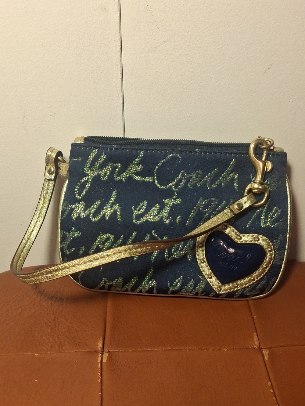 Coach Navy Script Wristlet with Gold Heart Charm